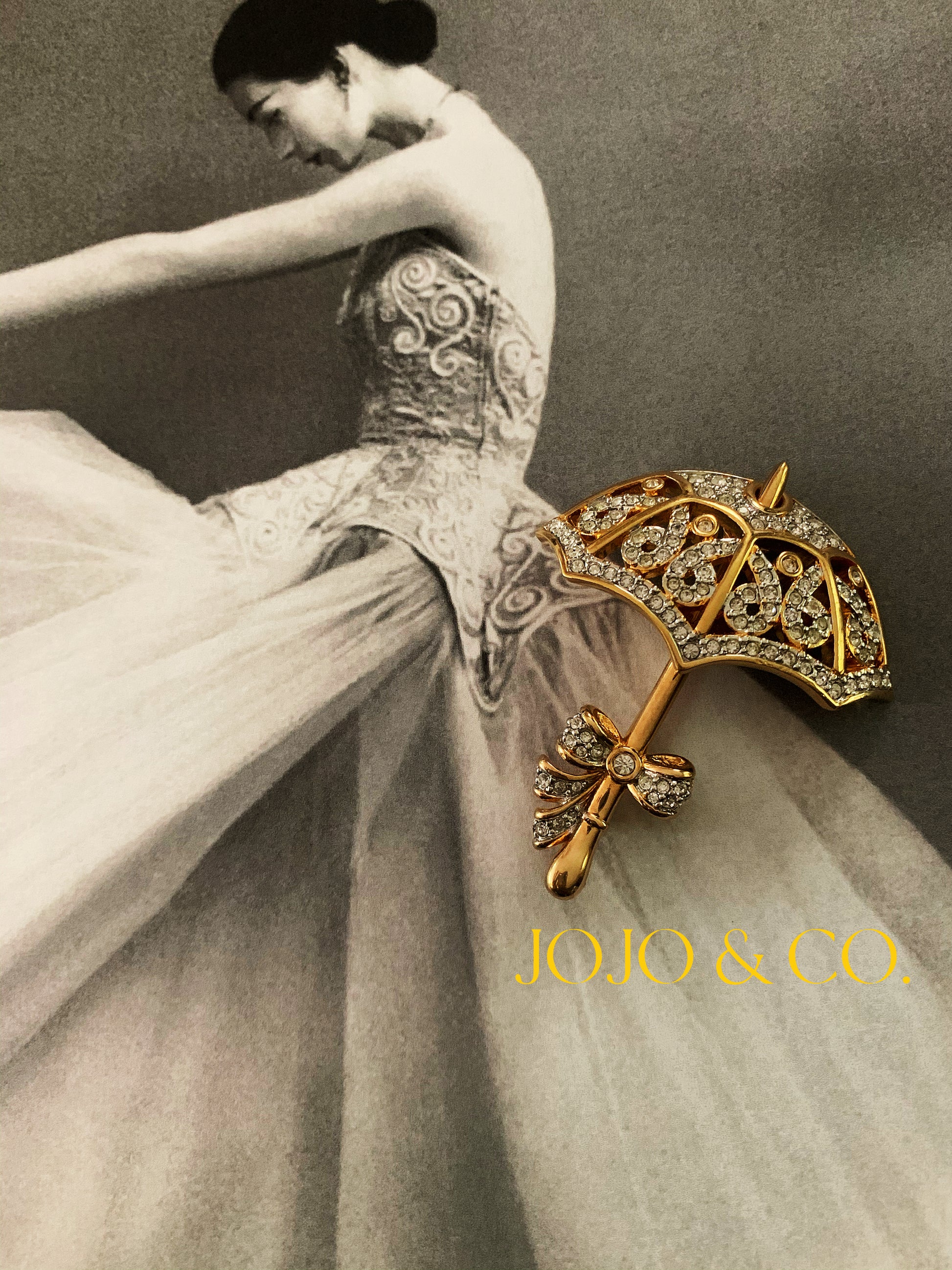 1980s Swarovski umbrella brooch