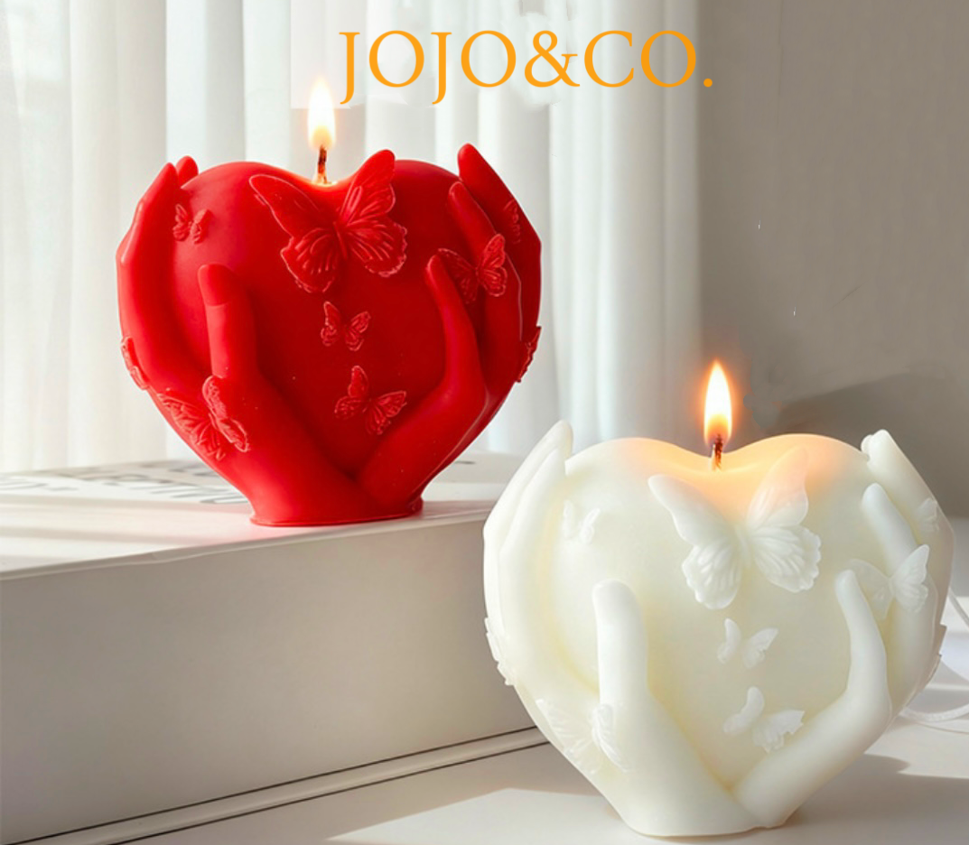 Sculptural Heart Candle with Butterfly Motif