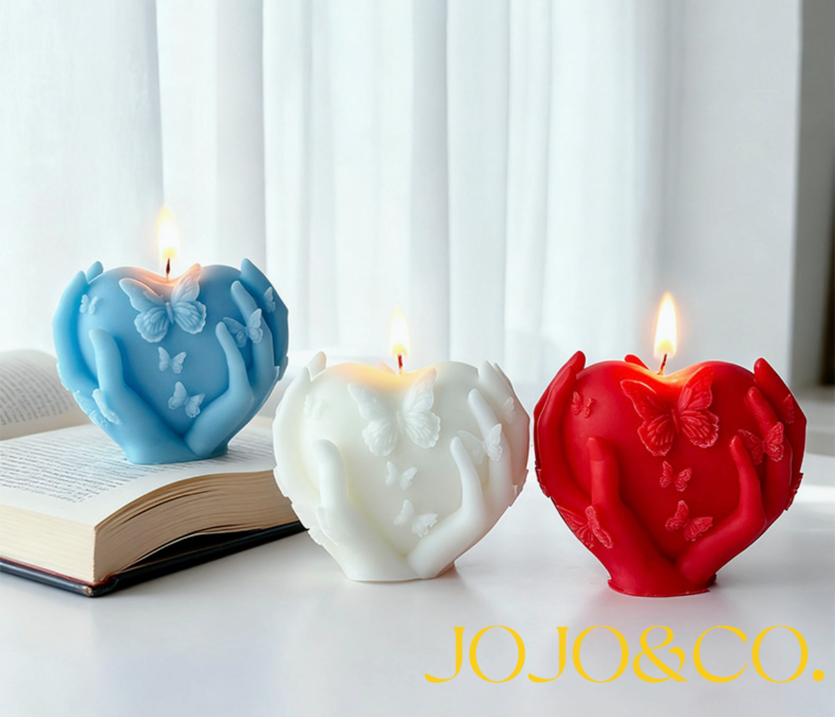 Sculptural Heart Candle with Butterfly Motif
